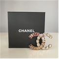 Chanel CC brooch